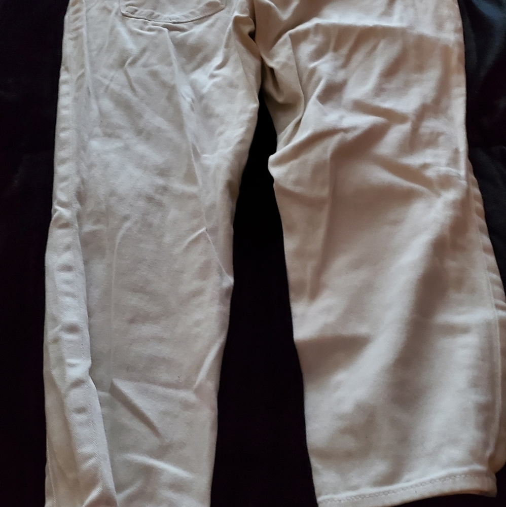DYNK white denim jeans. Size 8 40.00. CALVIN KLEIN denim jeans. Size 8. 125.00 B
